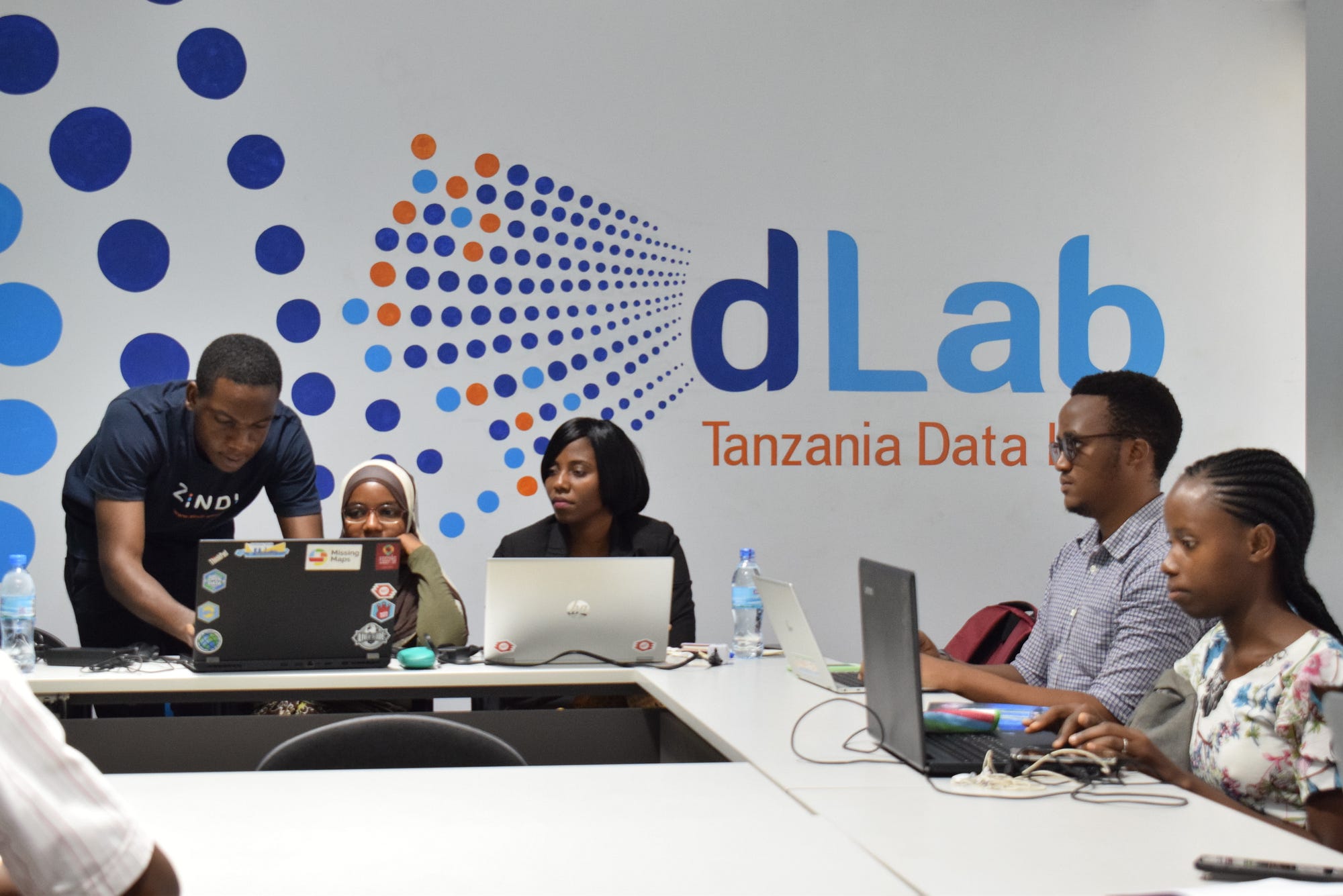 Davis David represents Zindi at a dLab event.