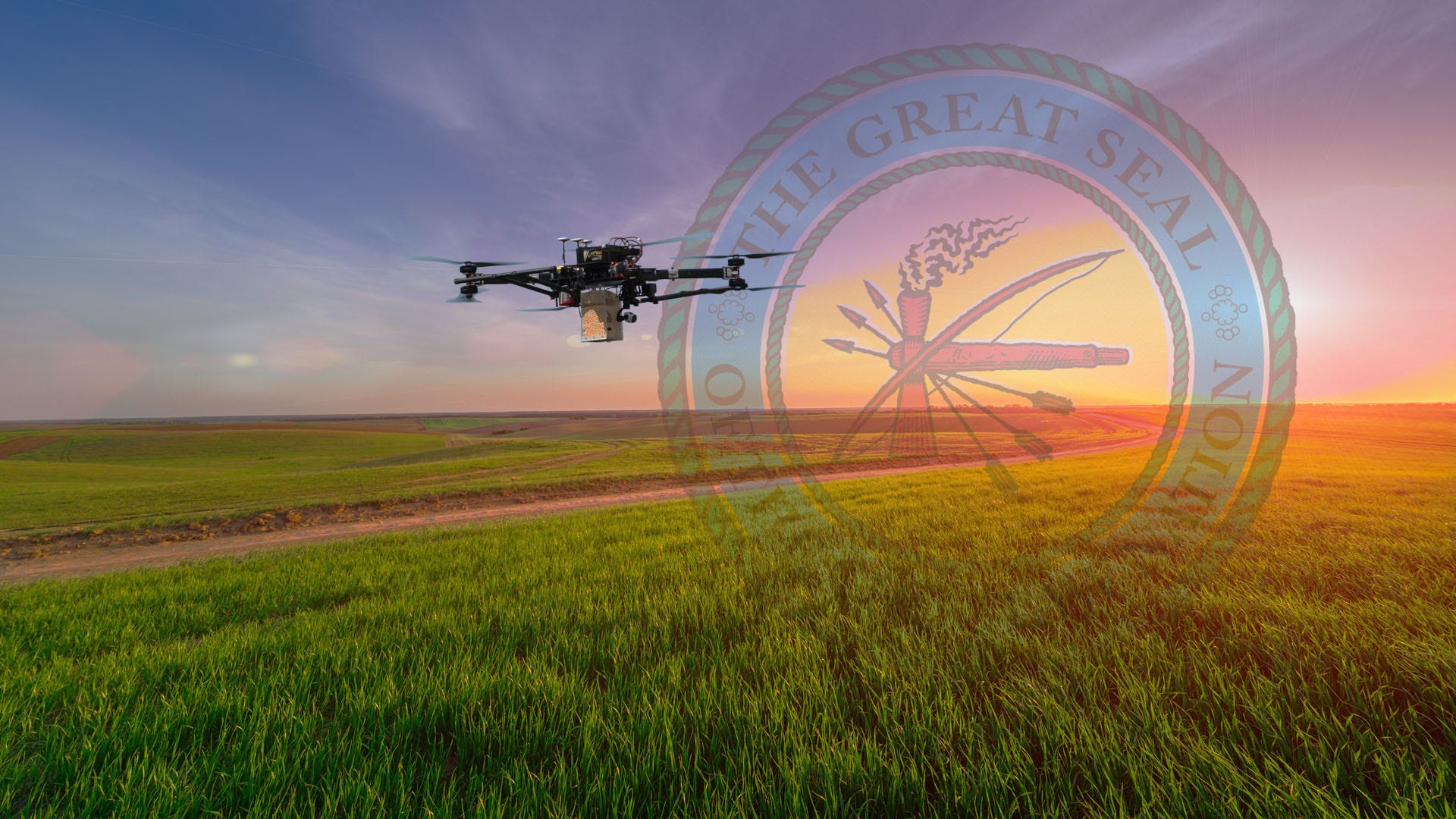 Drone over a farm with the Choctaw Nation of Oklahoma seal.