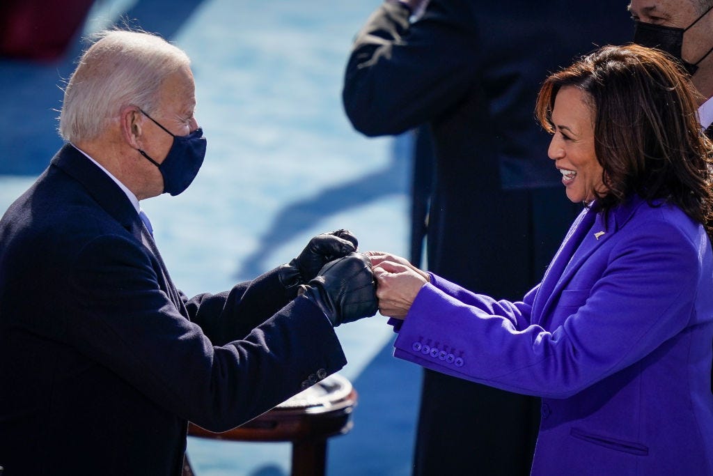 President Biden fist bumping Vice President Harris.