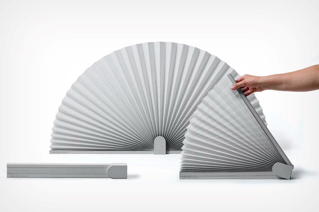 Desk Divider Opens Up Like A Fan Compact Enough To Be Used Anywhere