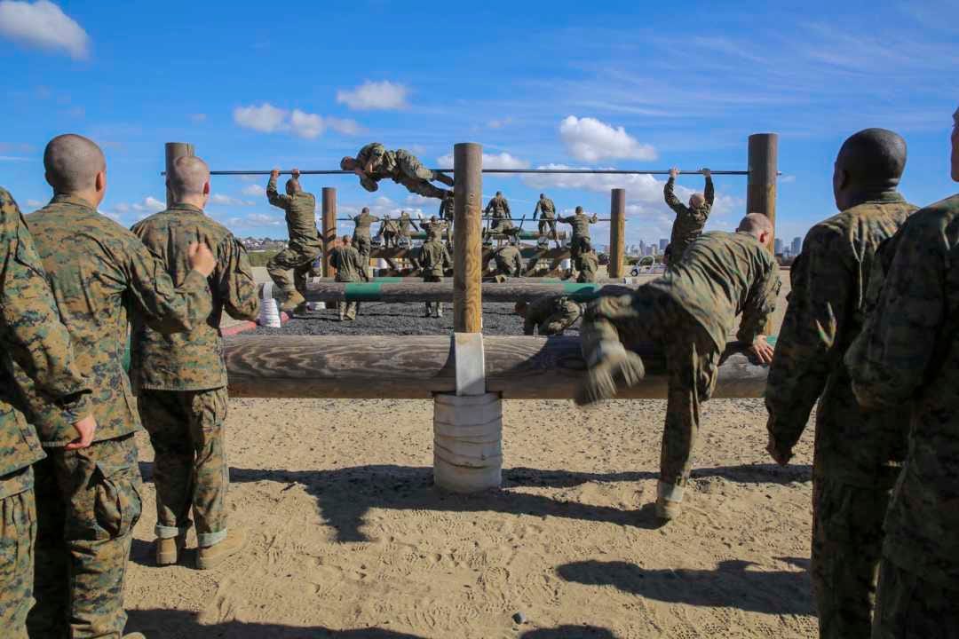 Line of military recruits waiting to begin doing a military course