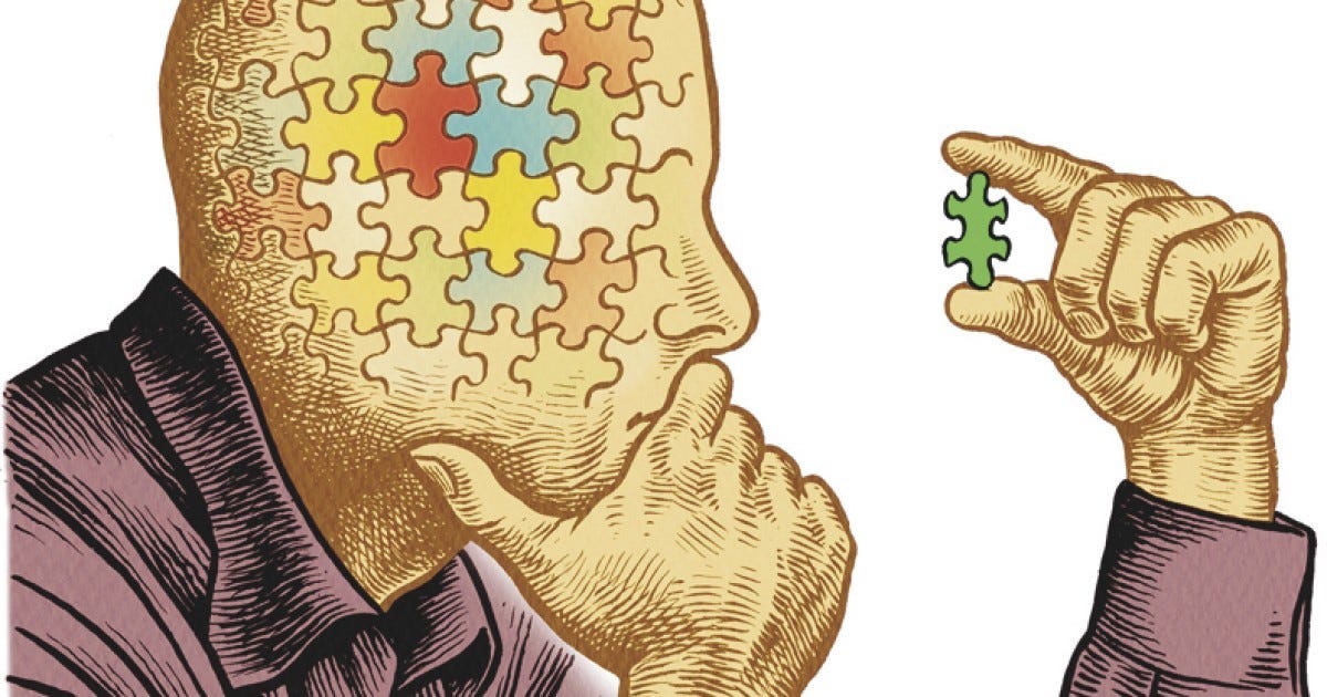 A man is thinking about how to fit a puzzle piece into his head.