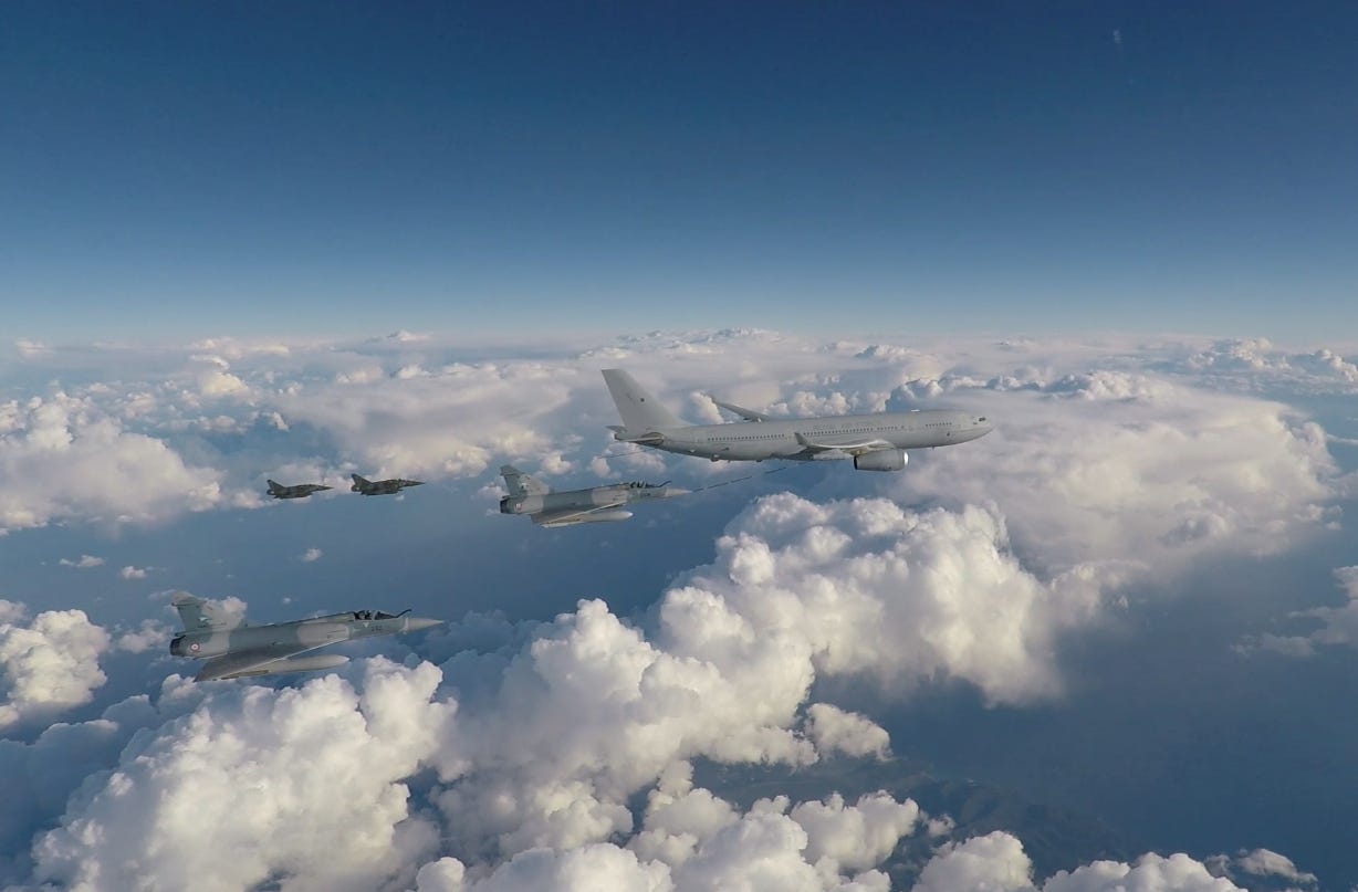 RAF Voyager taking part in a refuelling exercise with French Air Force Mirage fighters.