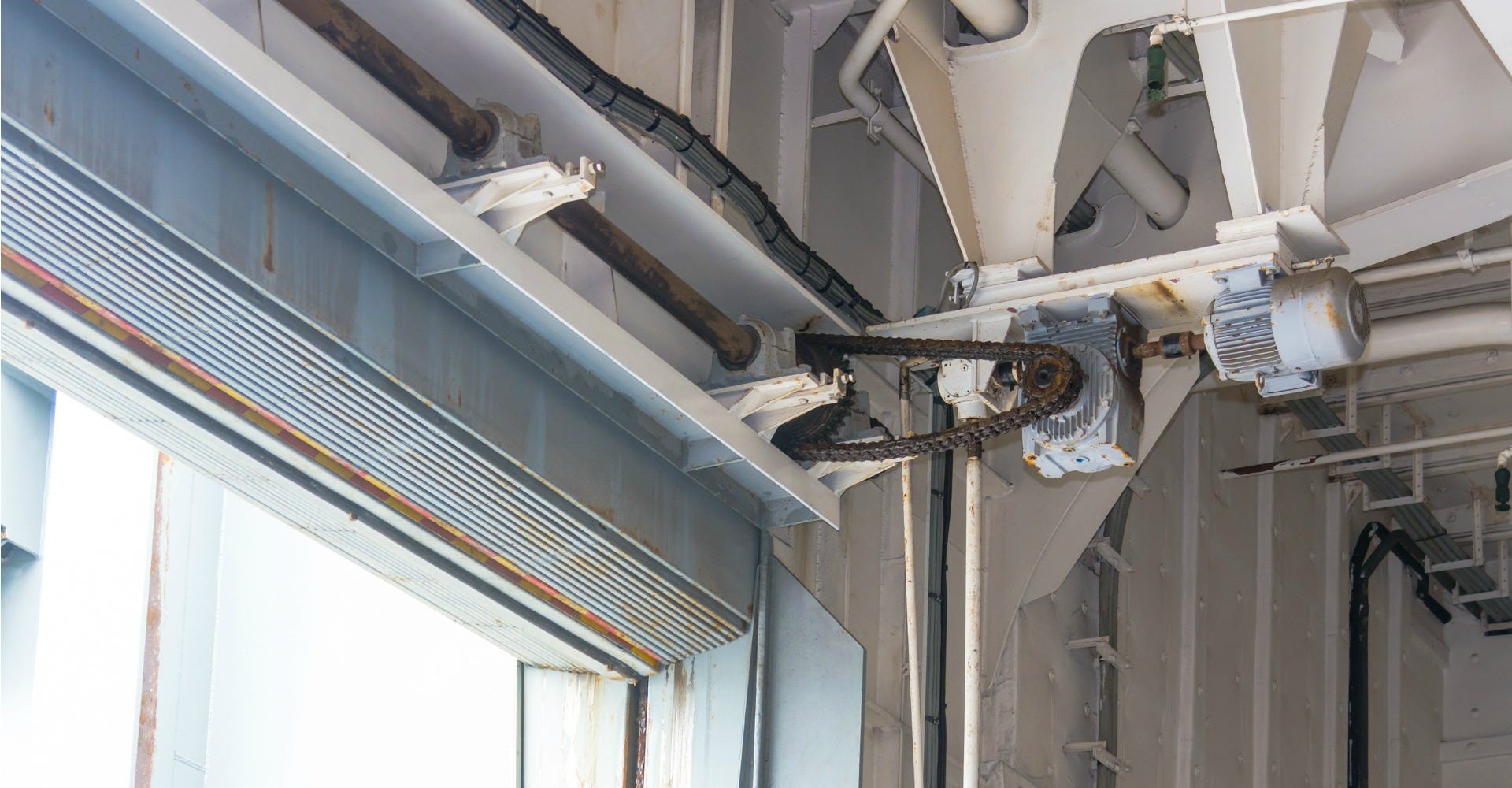 Why Your Commercial Garage Door Is So Loud And How To Fix It