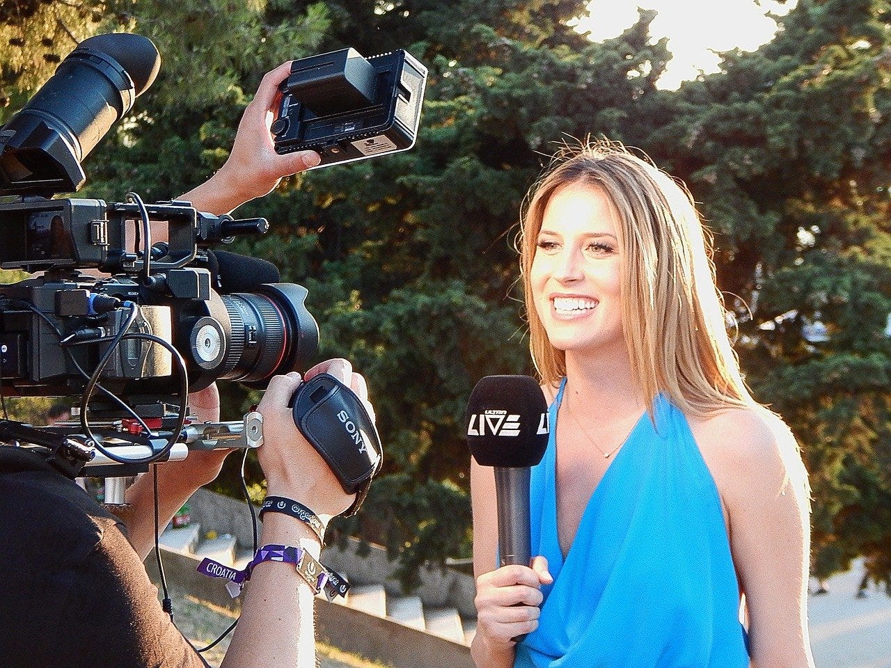 reporter in front of camera