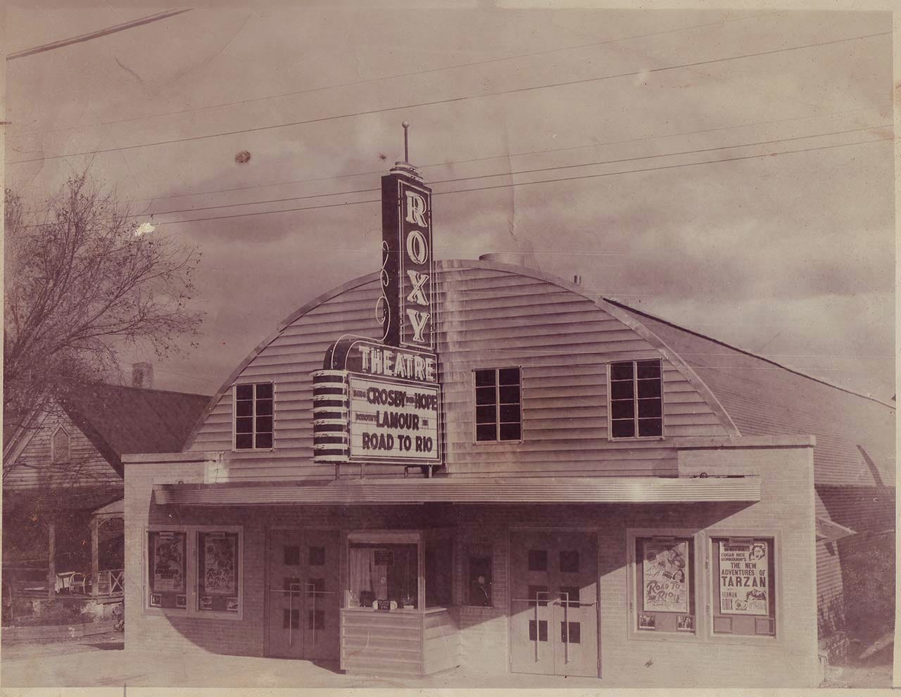 Lost History of the Roxy Theatre. A grainy old photo shows a crowd