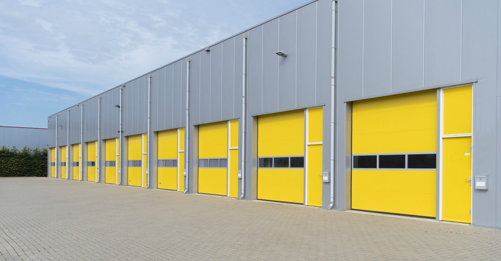 How To Get A Warehouse Door Back On The Track Frontier