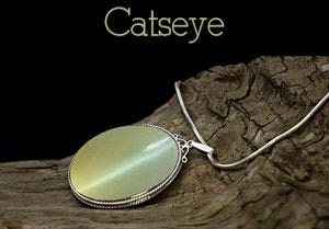 Wearing of Cat's Eye Gemstone. The Cat 