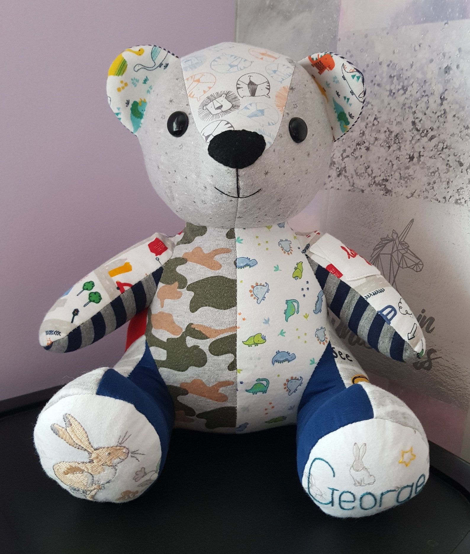 teddy bear made out of baby clothes