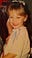 Little girl smiles at camera