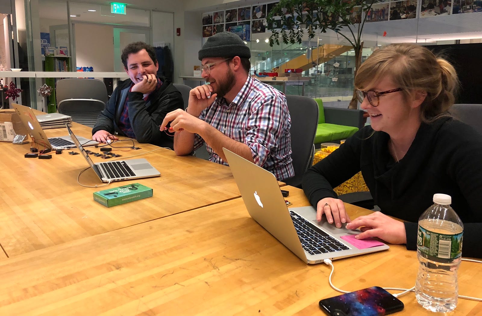 Kreg, Cecil, and Jordan doing some workshop planning.