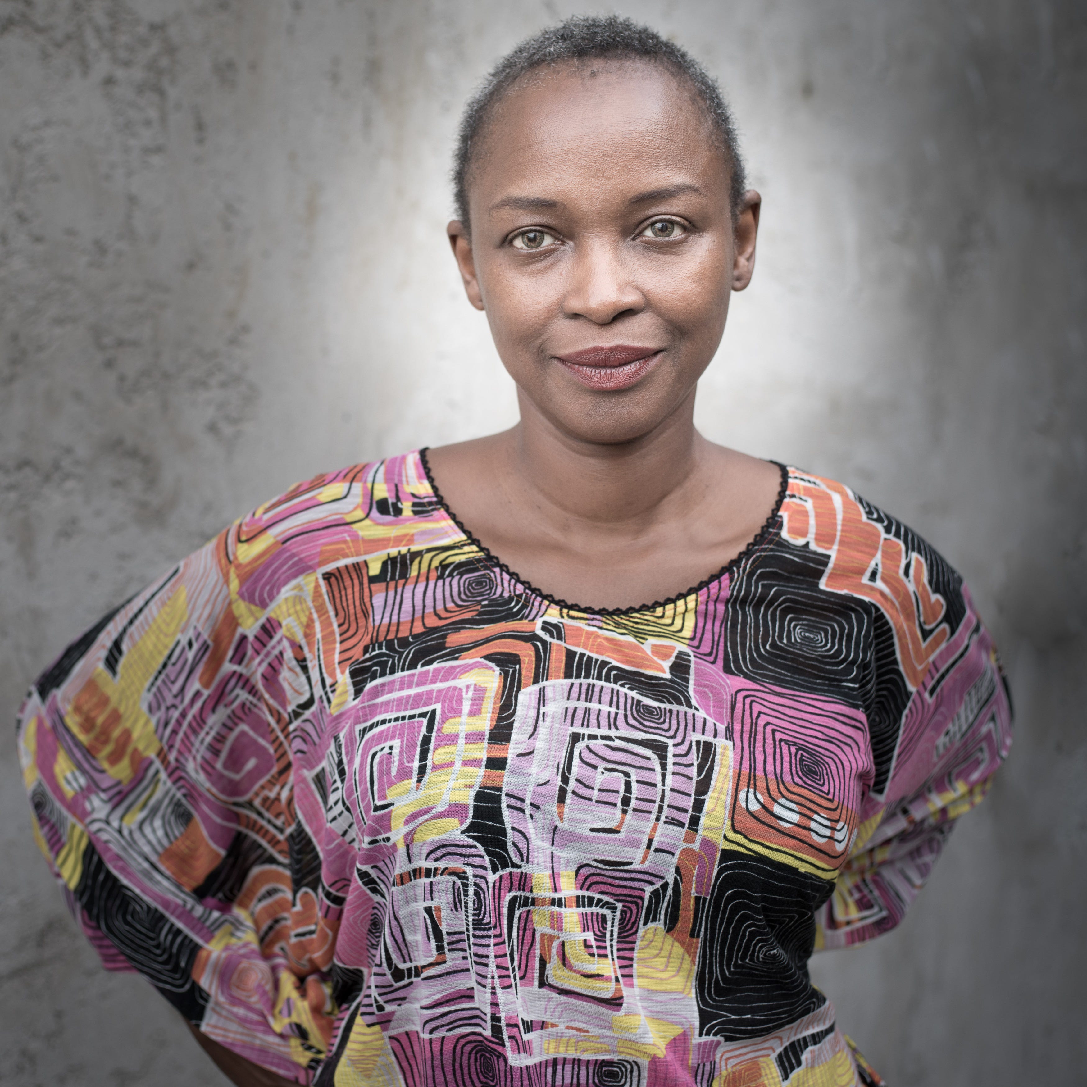 A portrait photograph of Koyo Kouoh, Executive Director and Chief Curator at Zeitz MOCAA