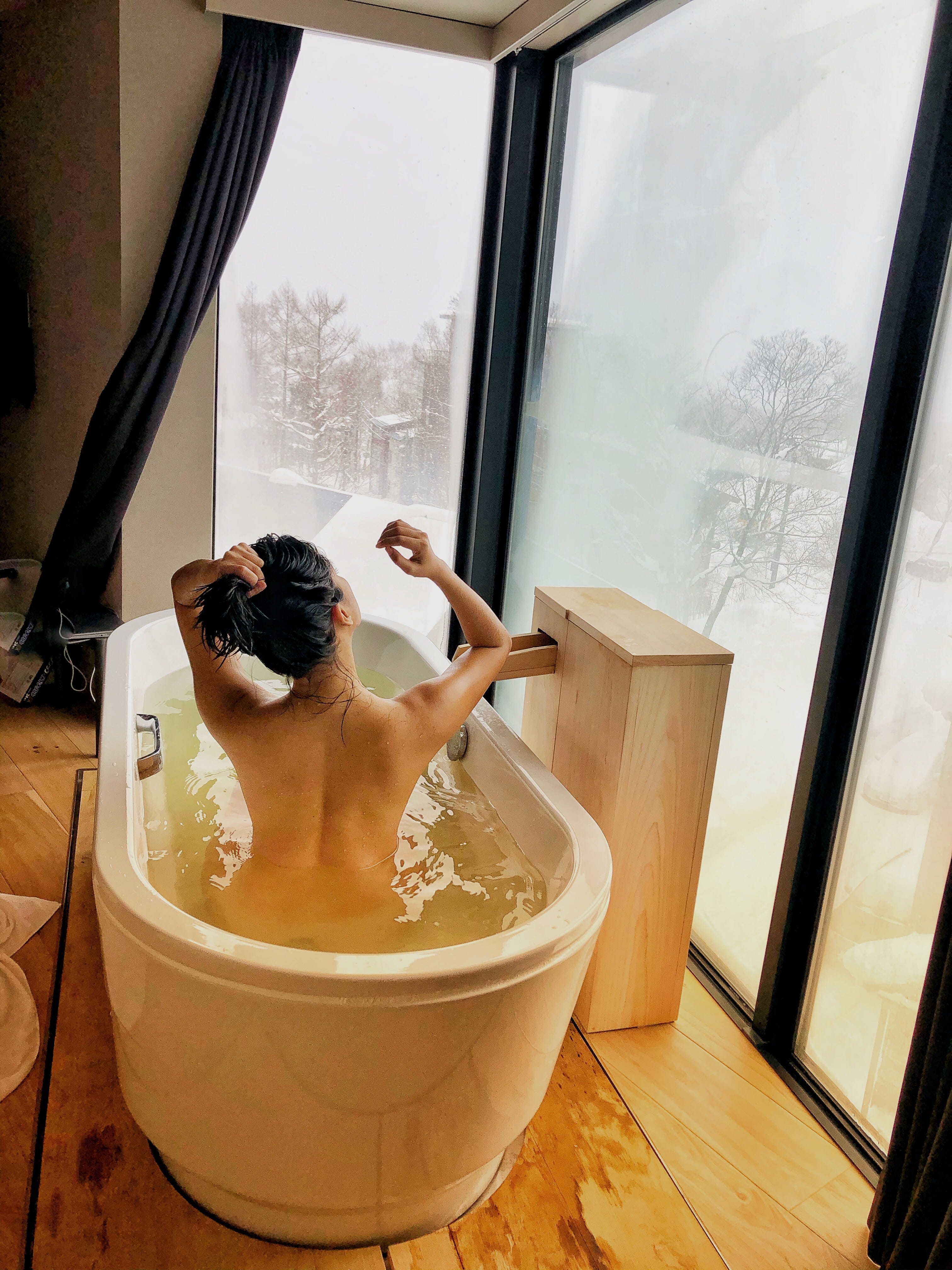 Soaking in the private onsen tub in Niseko, Hokkaido