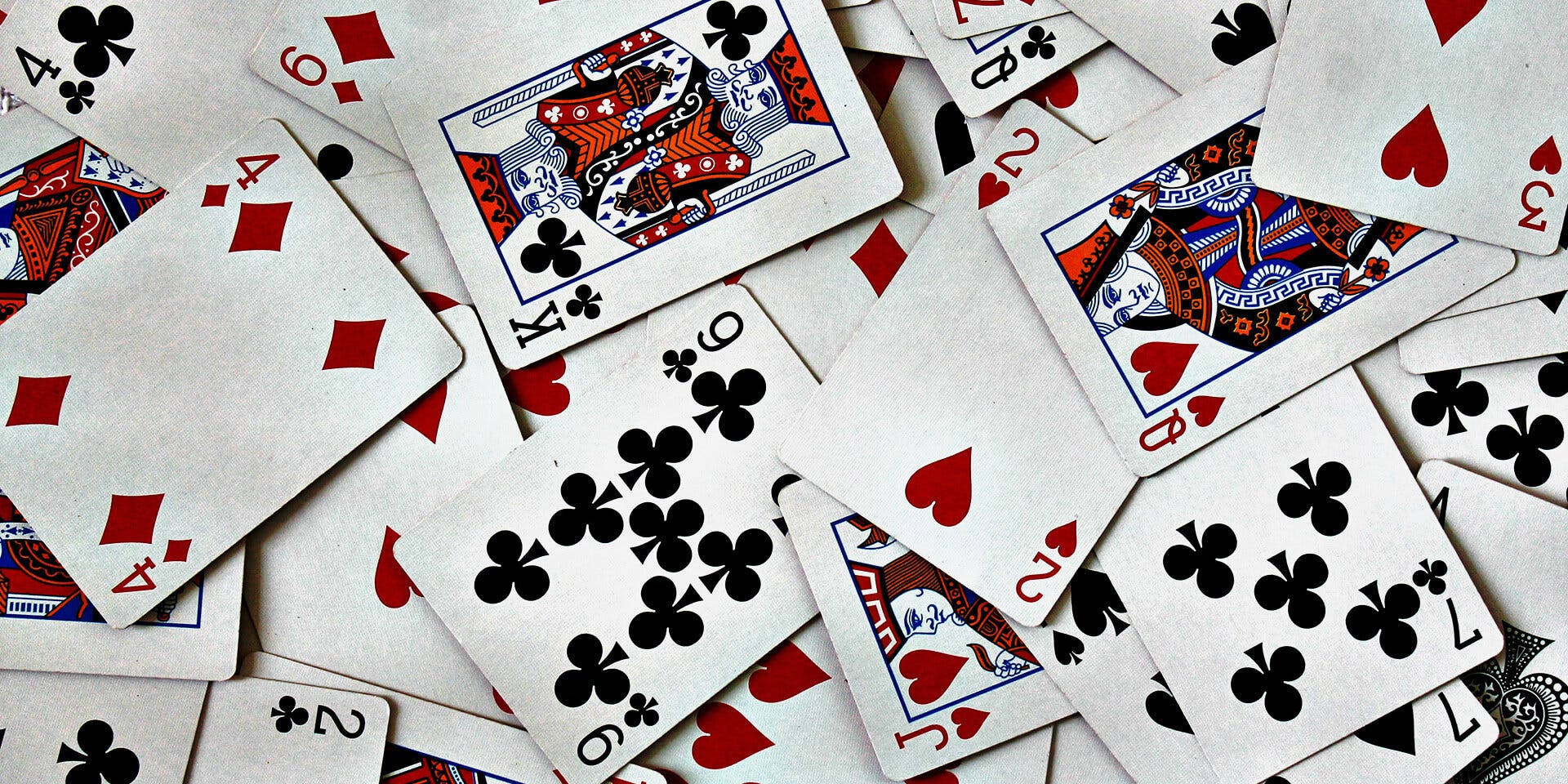 Playing cards scattered face-up