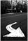 Left turn arrow on the cracked asphalt on a street in Kearny, NJ