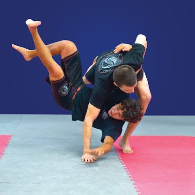 Comparing Grappling Mat Materials And Surfaces Brett Hart Medium