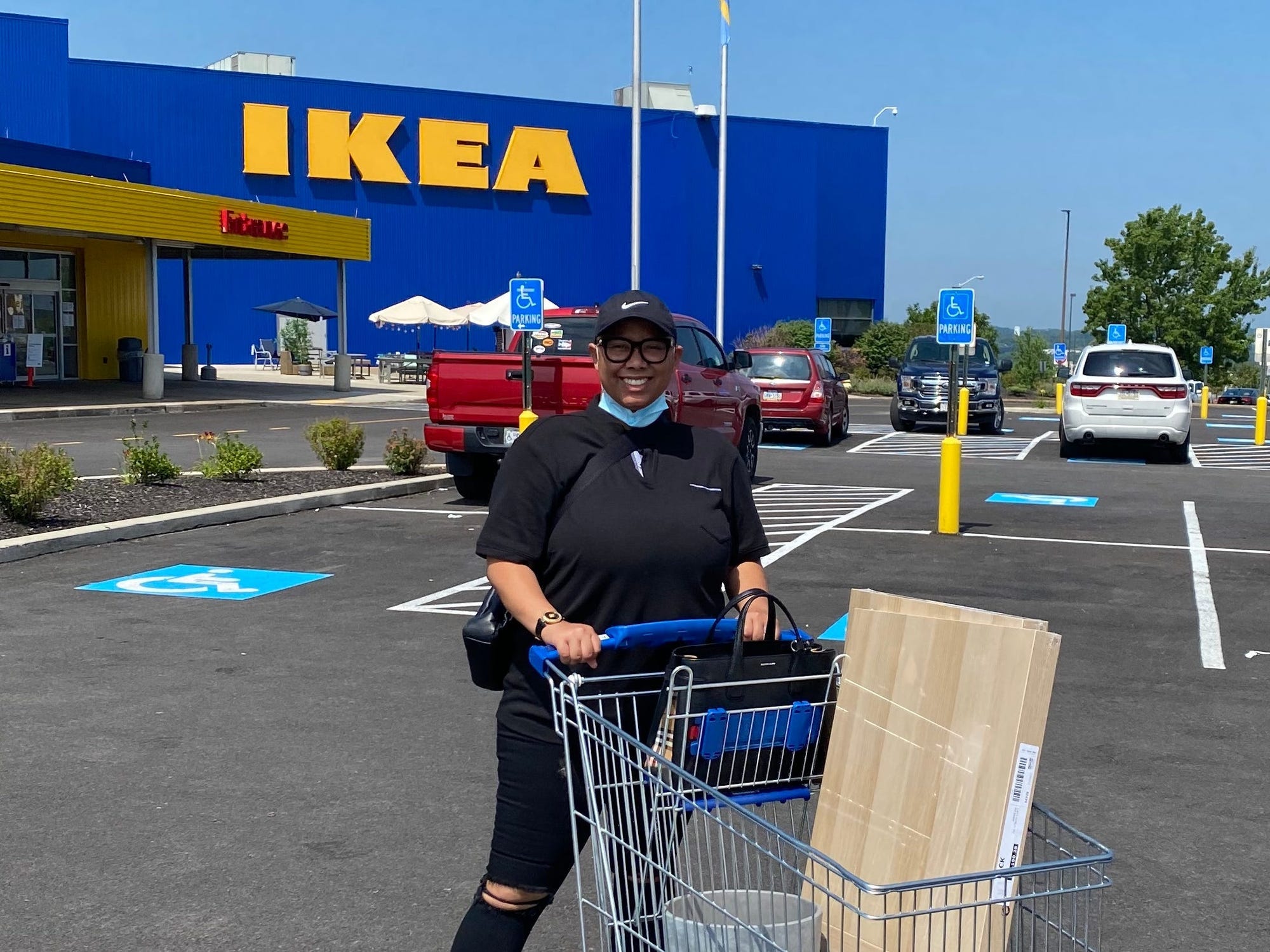 An individual with a shopping cart.