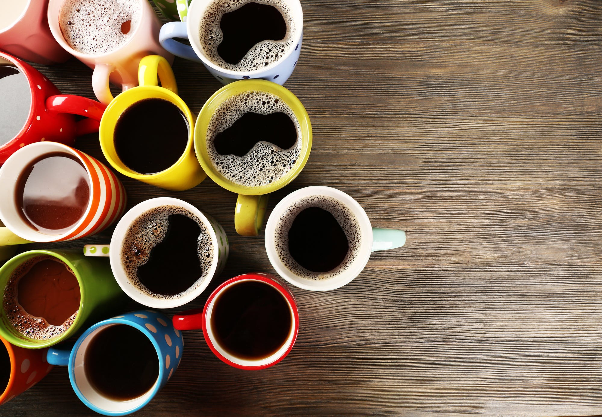 A table with several cups of coffee