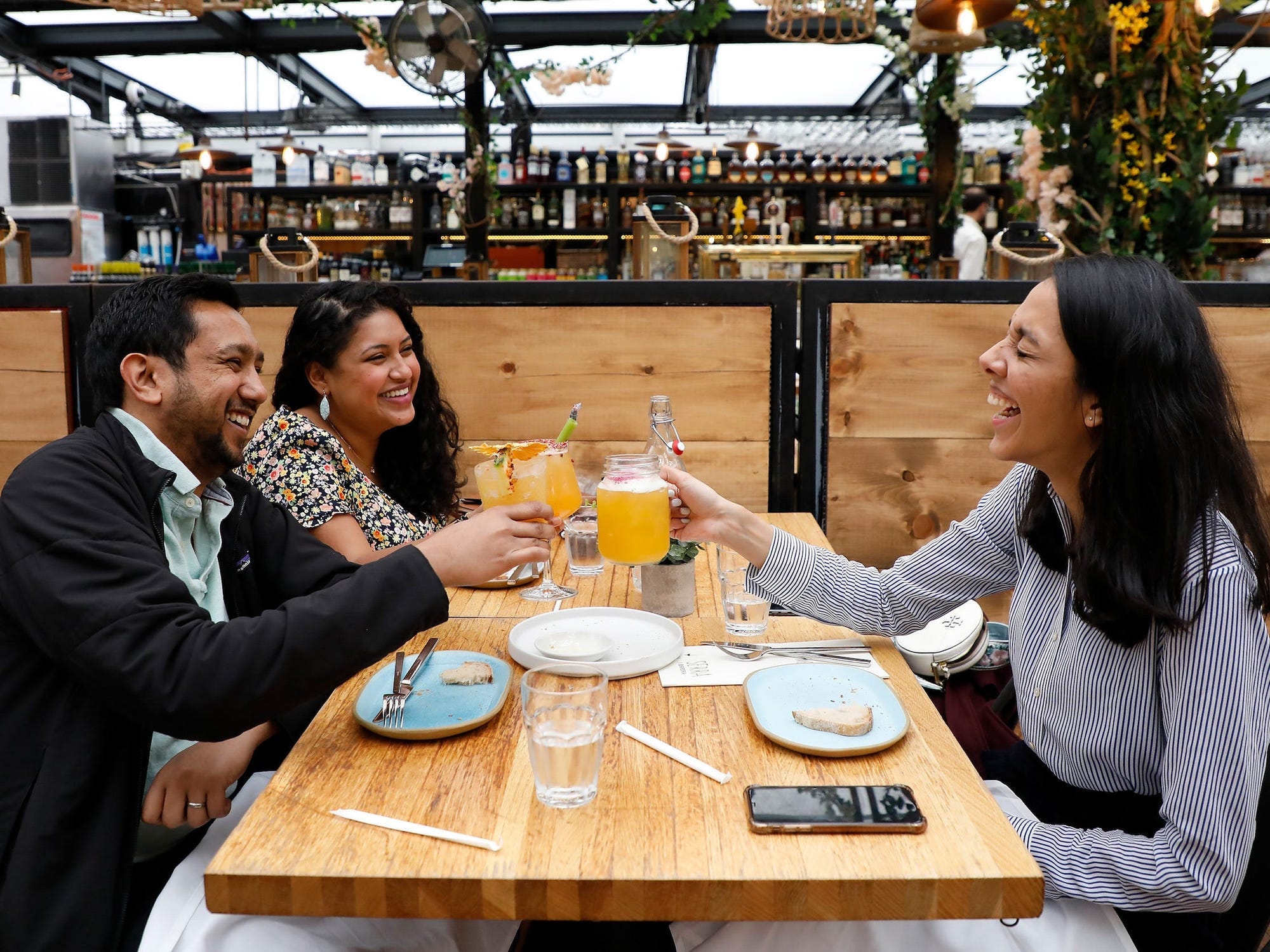 Individuals meeting for drinks.