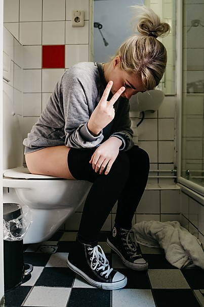 Girl Pooping On The Toilet