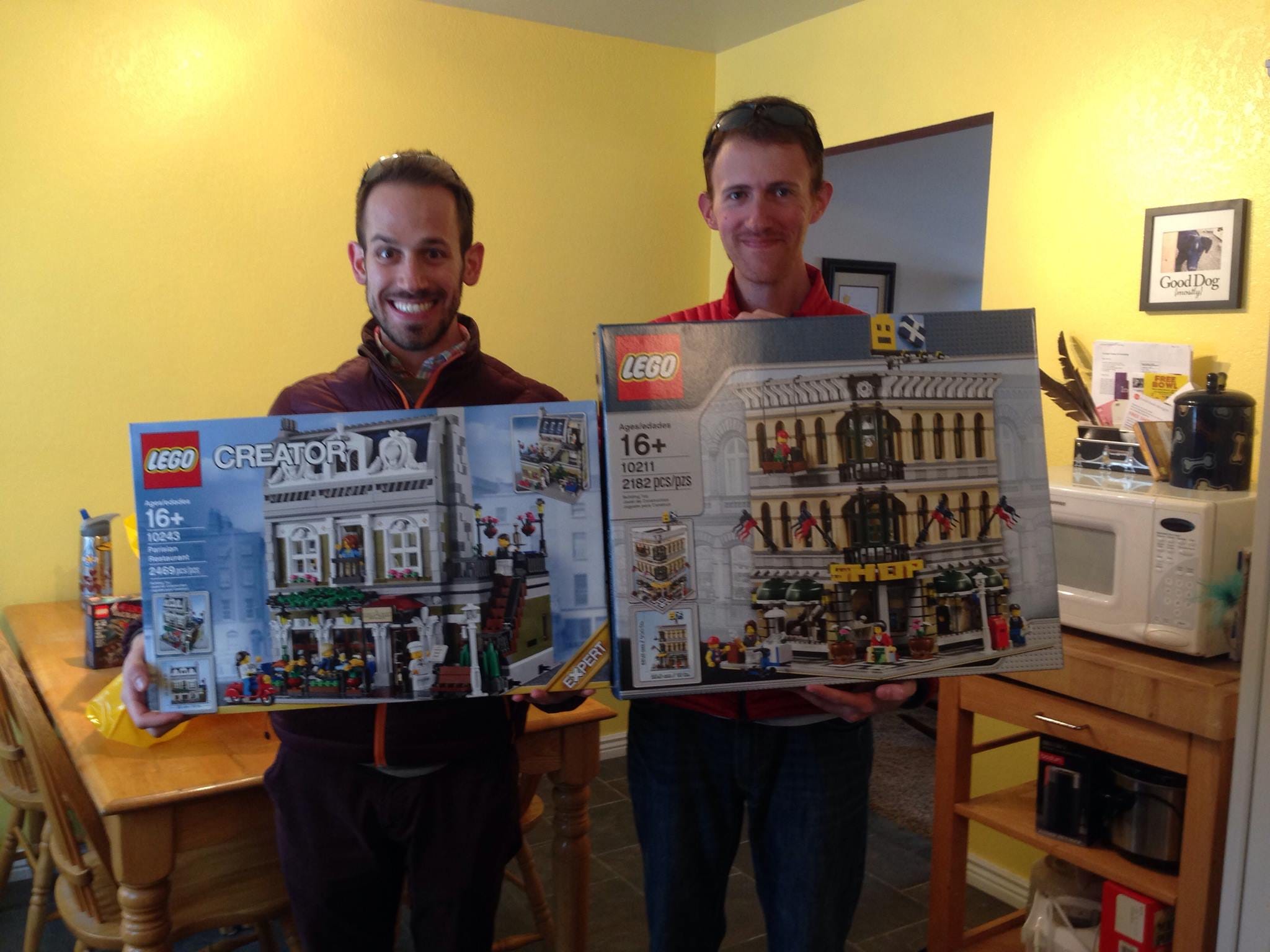 Cameron Naish and friend holding recent LEGO purchases.