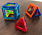 Cube, Tetrahedron and another polyhedron comprised of 3 squares and 2 triangle faces