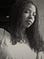 A black & white photo of Desha Dauchan looking slightly to her left