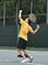 The author playing tennis