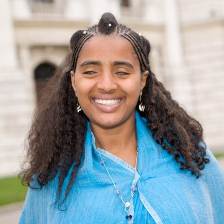 A picture of Yetnebersh Nigussie, smiling.