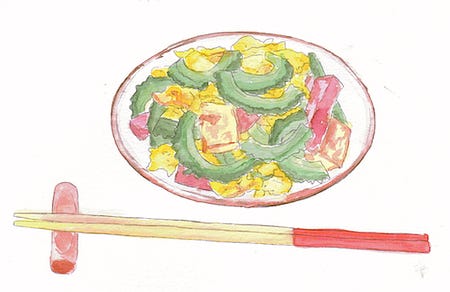 A colorful dish filled with vegetables.