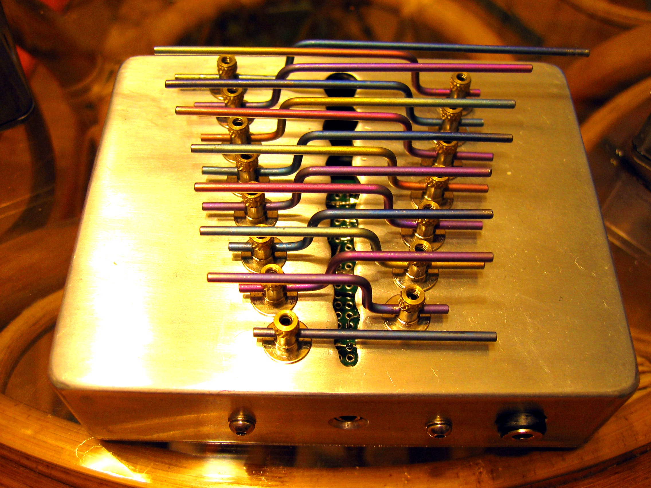 How to build an electric mbira from titanium bicycle spokes and radio