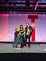Jeff Goins on stage with wife, son and daughter at the closing of Tribe Conference.
