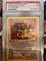 My Friend’s Charizard Card, encased and graded with score 7 | photo taken by author