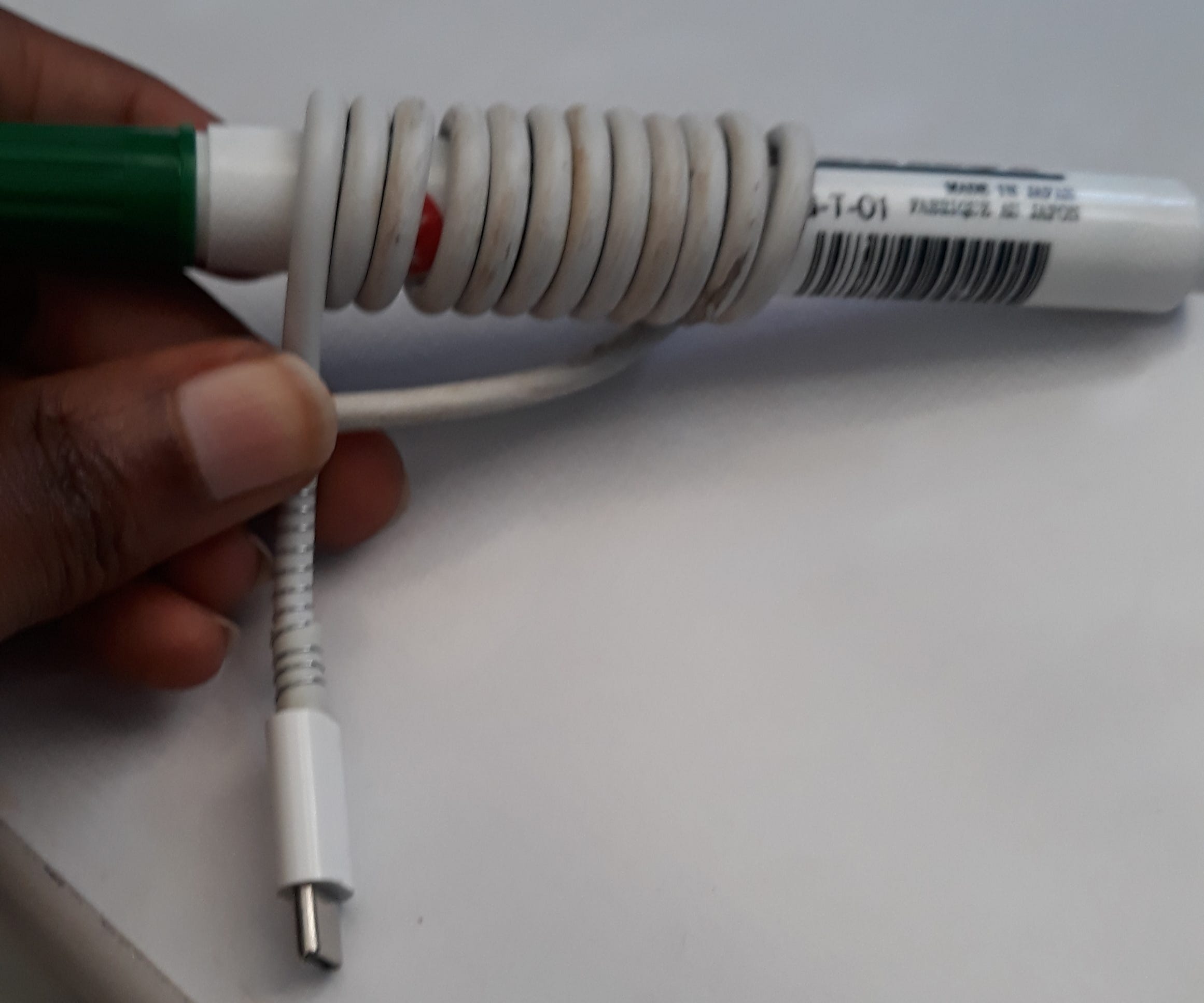 A simple hack to protect your Mac charging cord from fraying by