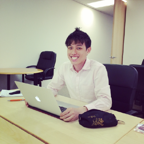 Picture of Allan Teng sitting at a desk