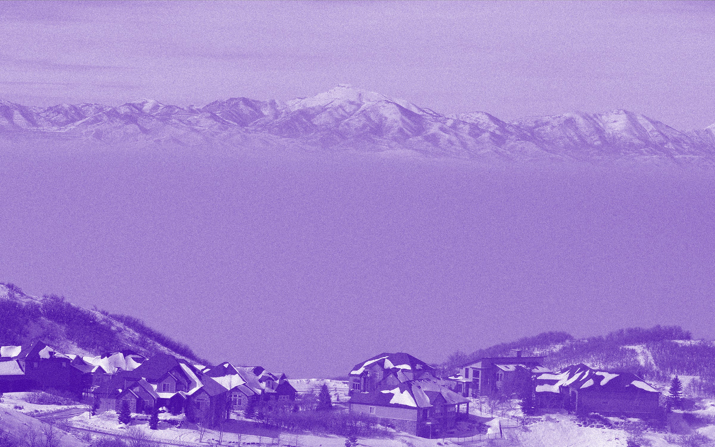 A shot of Salt Lake City’s skyline in a purple hue.