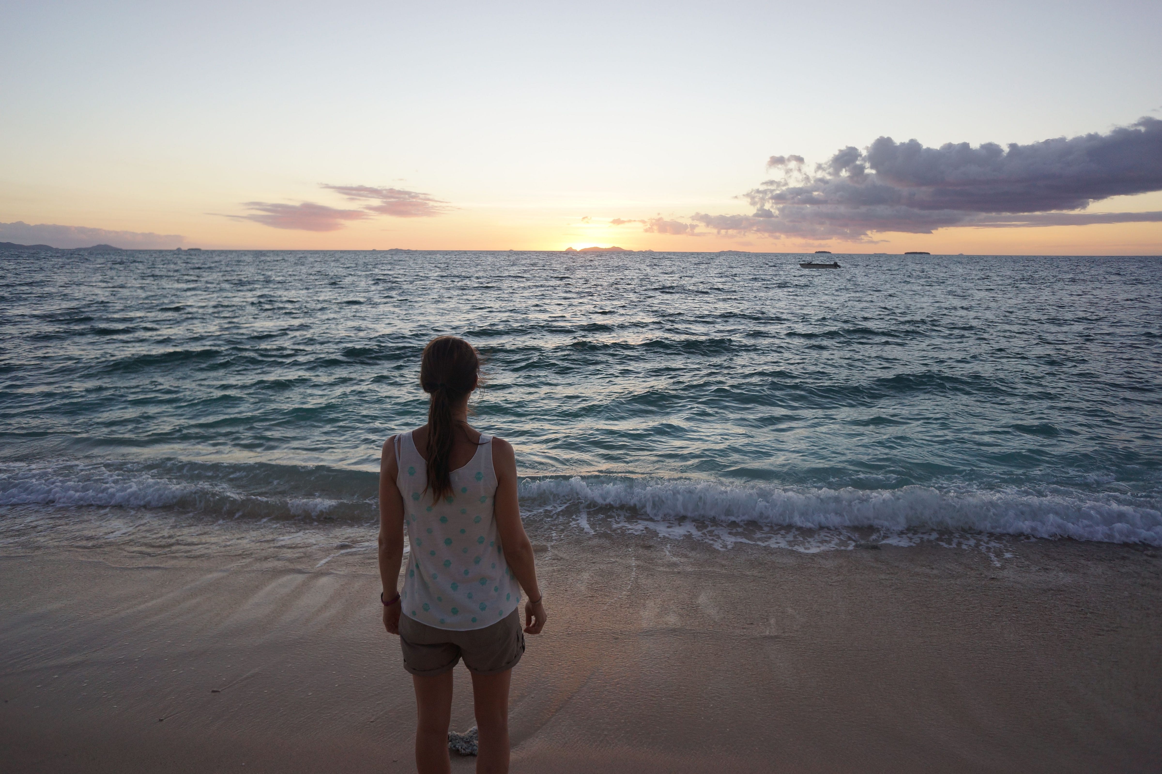 Don T Quit Your Job To Travel The World Personal Growth Medium - my wife!    watching the sun go down from a small island in the south pacific near!    fiji i m the photographer