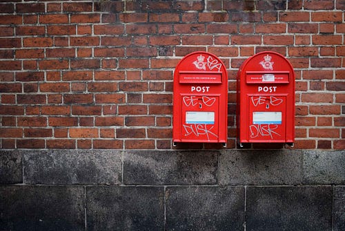 Two red British postboxes