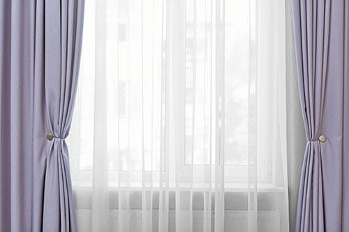 How To Clean Your Curtains Without Taking Them Down