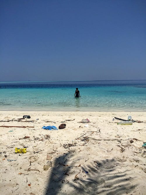 Plastic washed up onto the shore without anyone to clean up.
