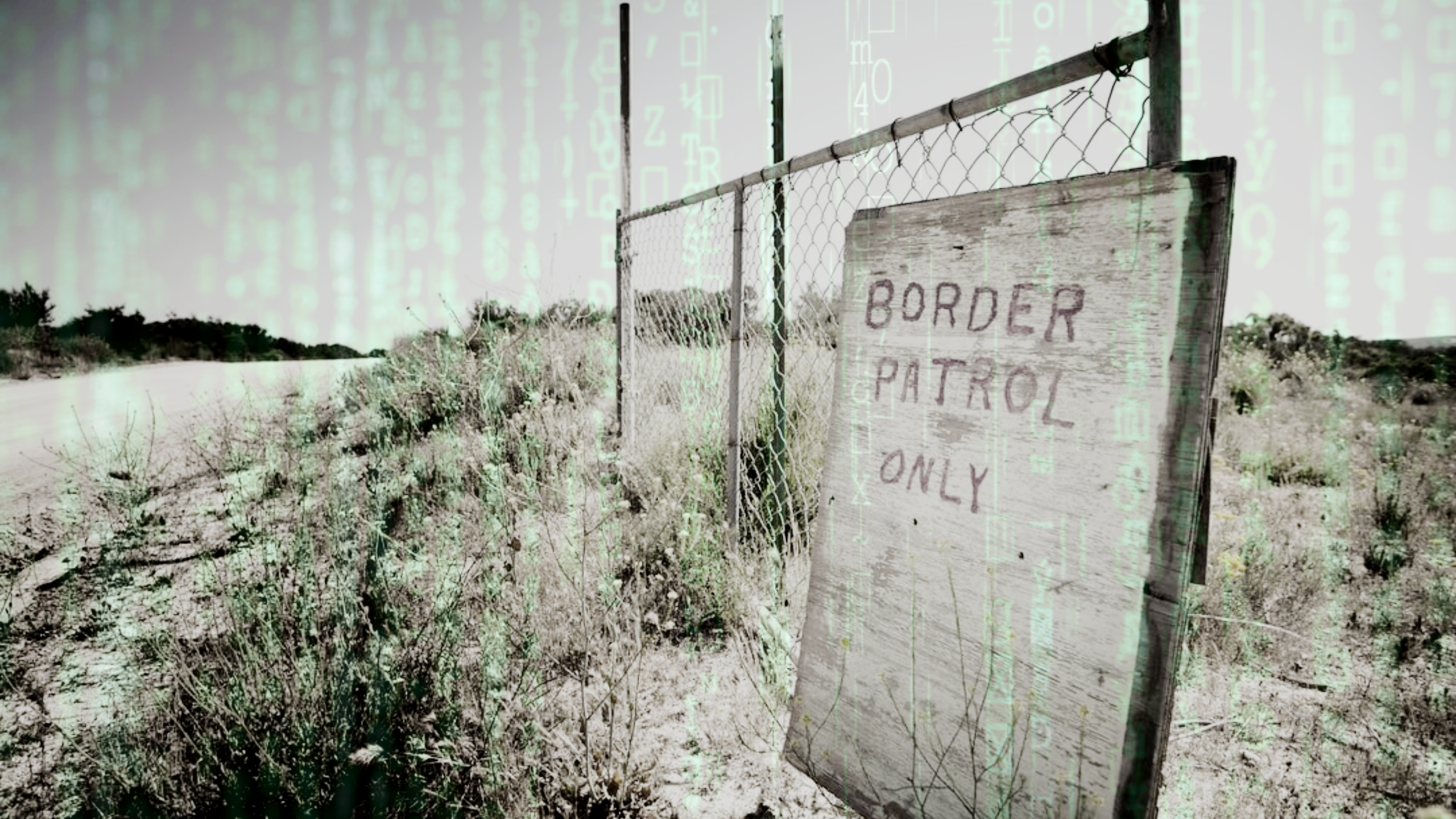 A desolate fence with a sign reading ‘Border Patrol Only’ with green code overlay