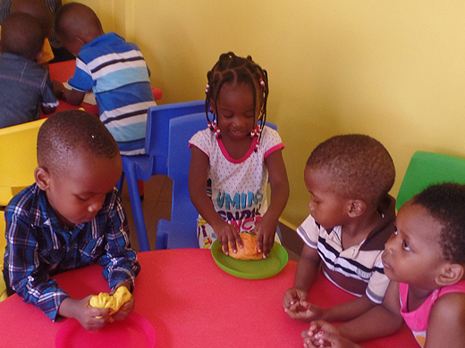 children playing with playdough