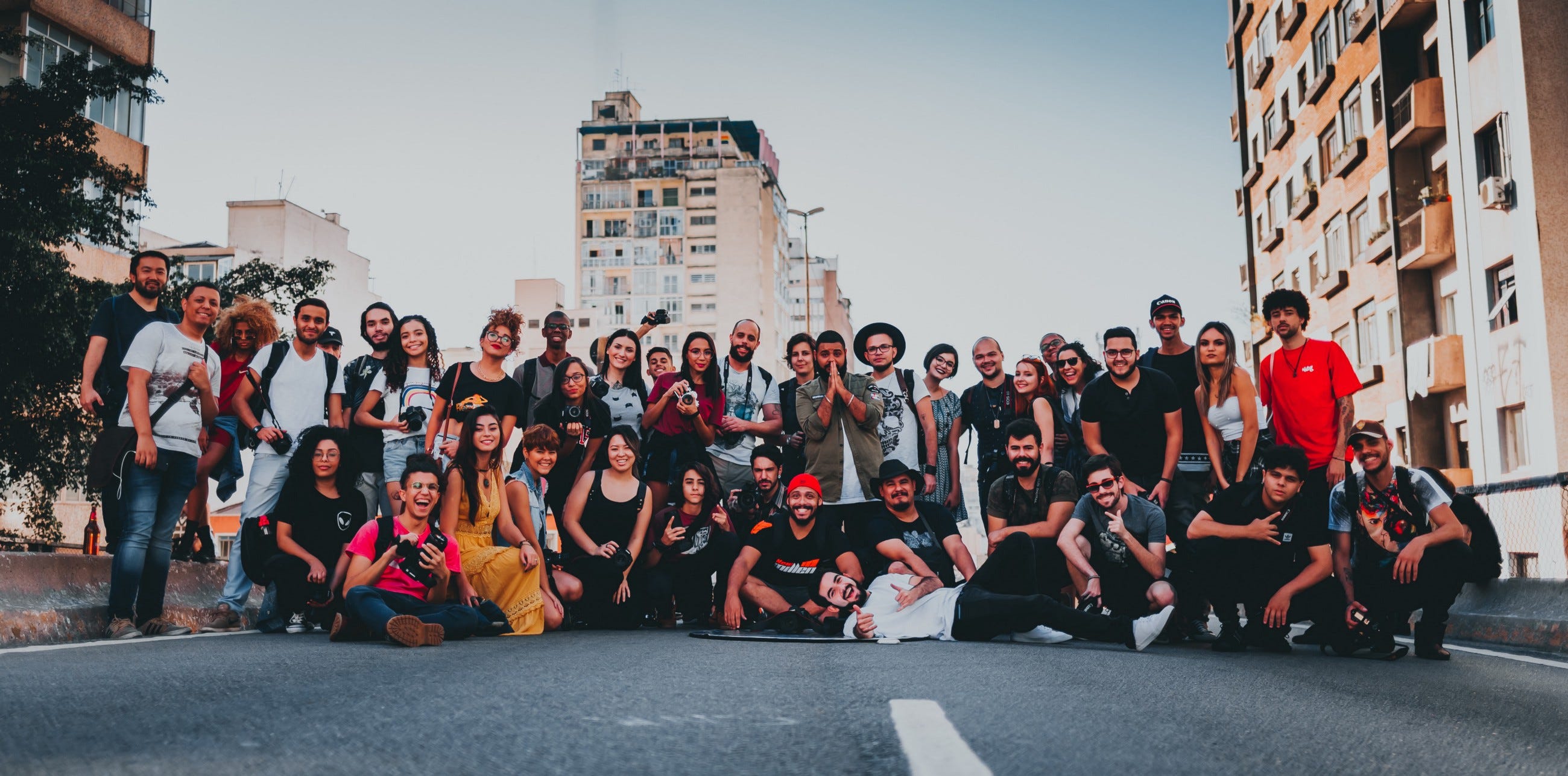A group of diverse people posing for a photo