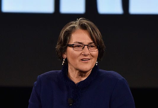 Joanna Hoffman speaking on a stage.