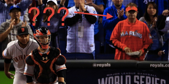 guy in marlins jersey behind home plate