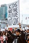 Protest sign that reads “Kids are the Future, not guns”