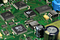 A picture of a printed circuit board populated with different componets