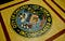 Seal of Chicago located on the floor of  City Hall.  This can be found in the hallway between the alderman's offices and the meeting chambers.