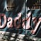 Daddy bubble letters painted on a brick wall