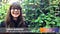 Woman with long brown hair and black framed glasses standing in front of greenery. Text reads: “Sarah Barnard. WELL AP, LEED AP, ASID Ones To Watch Scholar. ASID Virtual Conference.”